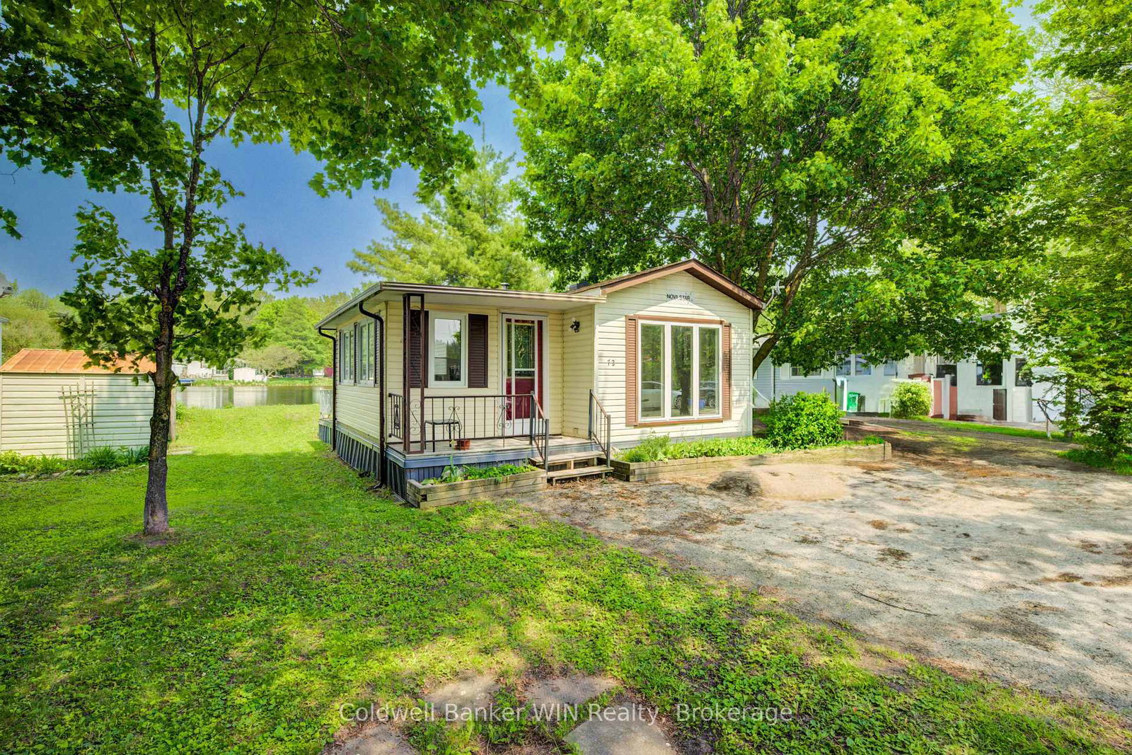 72-lakeside-7489-side-road-5-e-wellington-north-ontario-x12200058