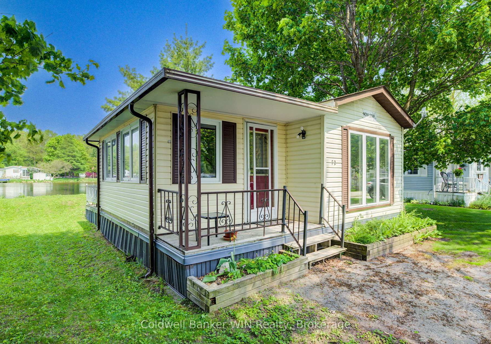 72-lakeside-7489-side-road-5-e-wellington-north-ontario-x12200058